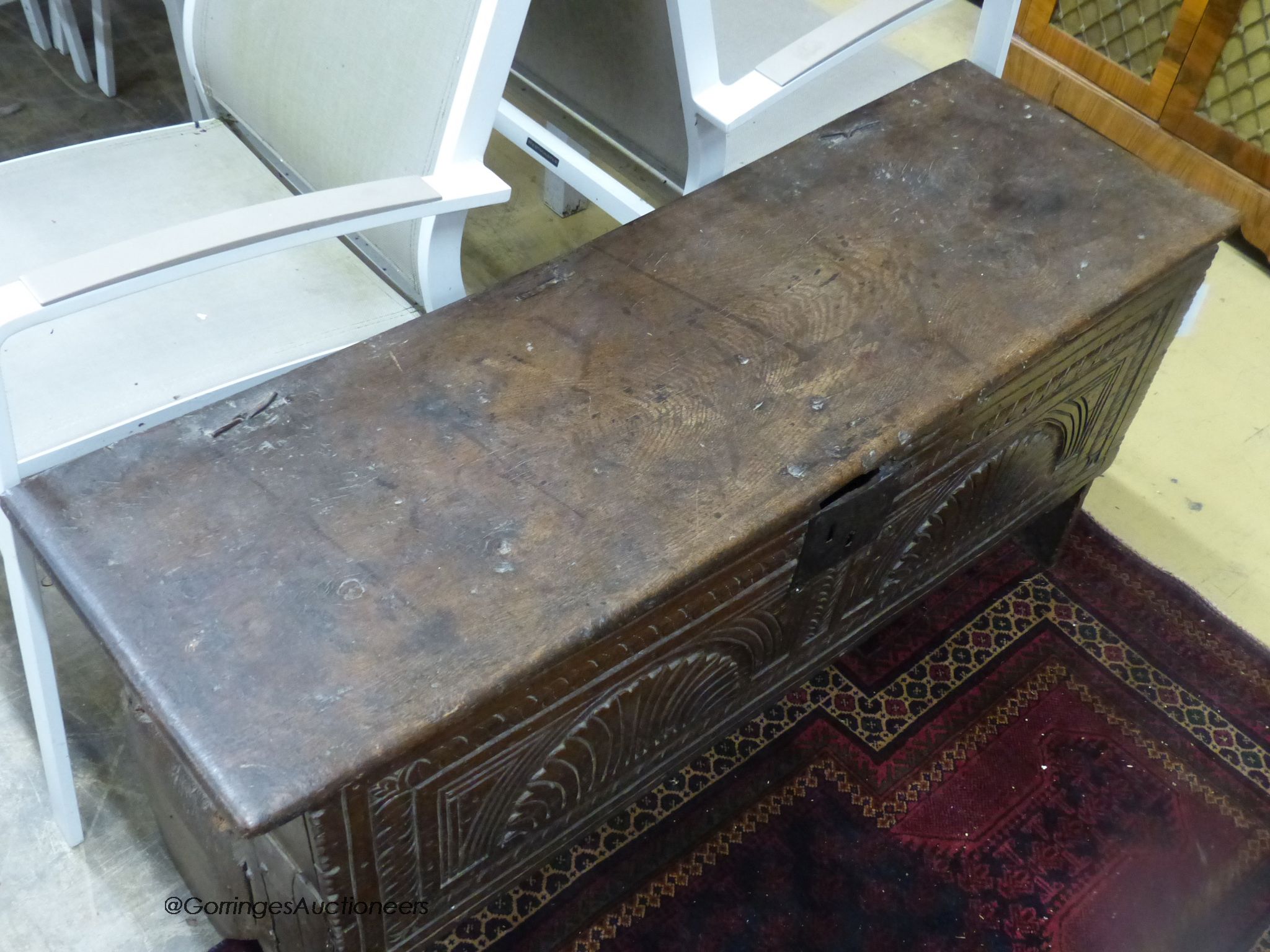 A 17th century six plank coffer, length 115cm, depth 38cm, height 54cm